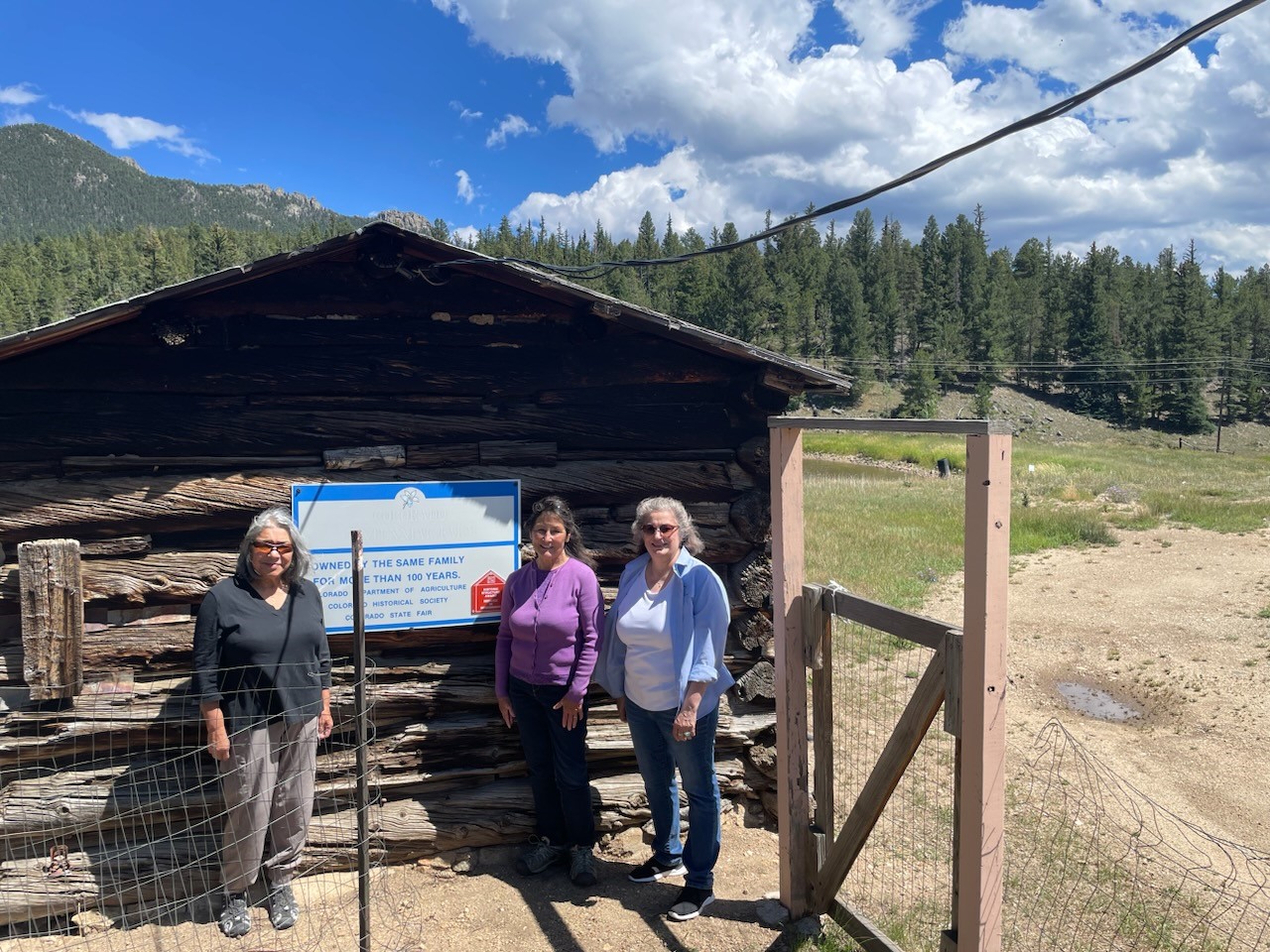 Gilpin County Commissioners in front of the Centennial Farm sign